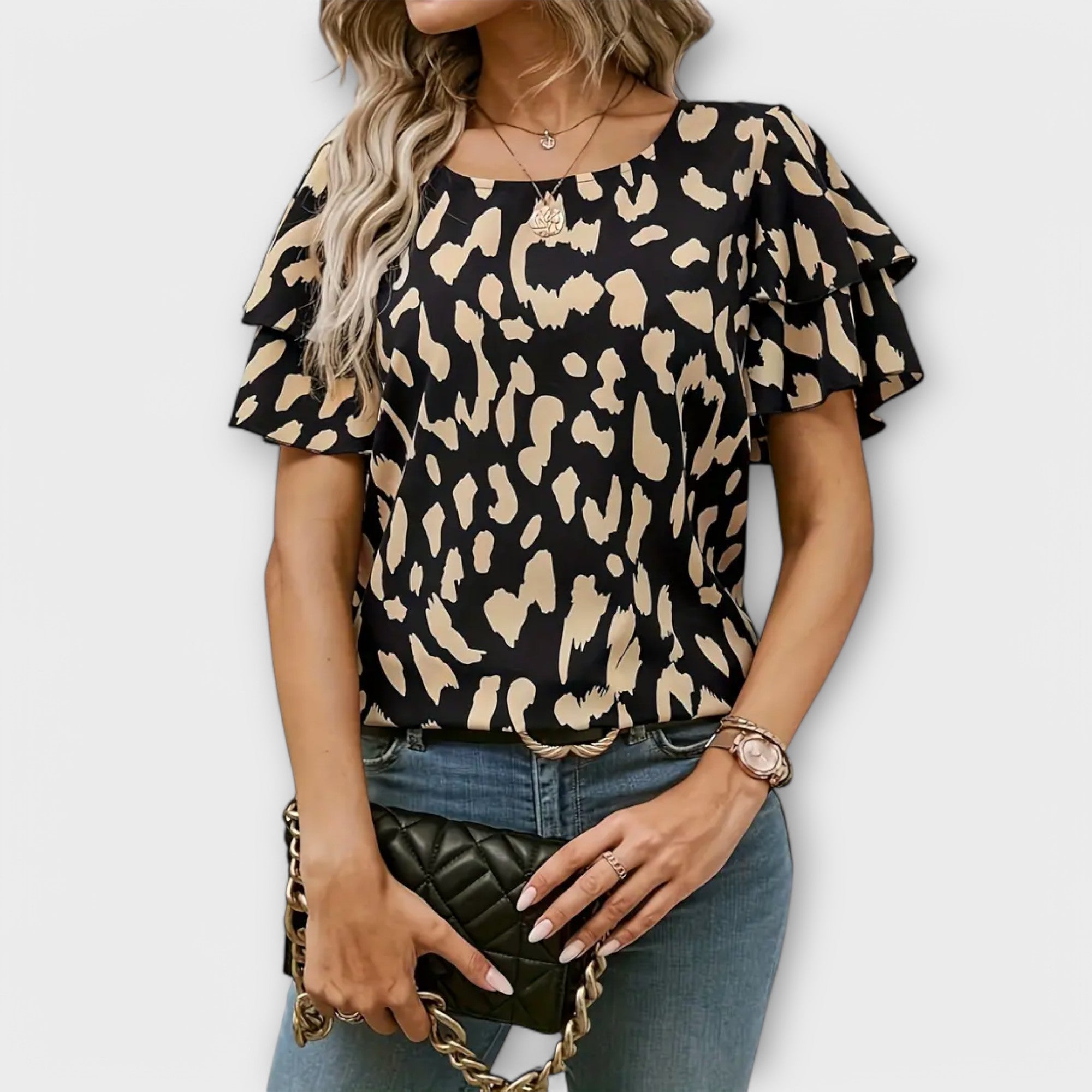 Lela - Elegant blouse with leopard sleeves