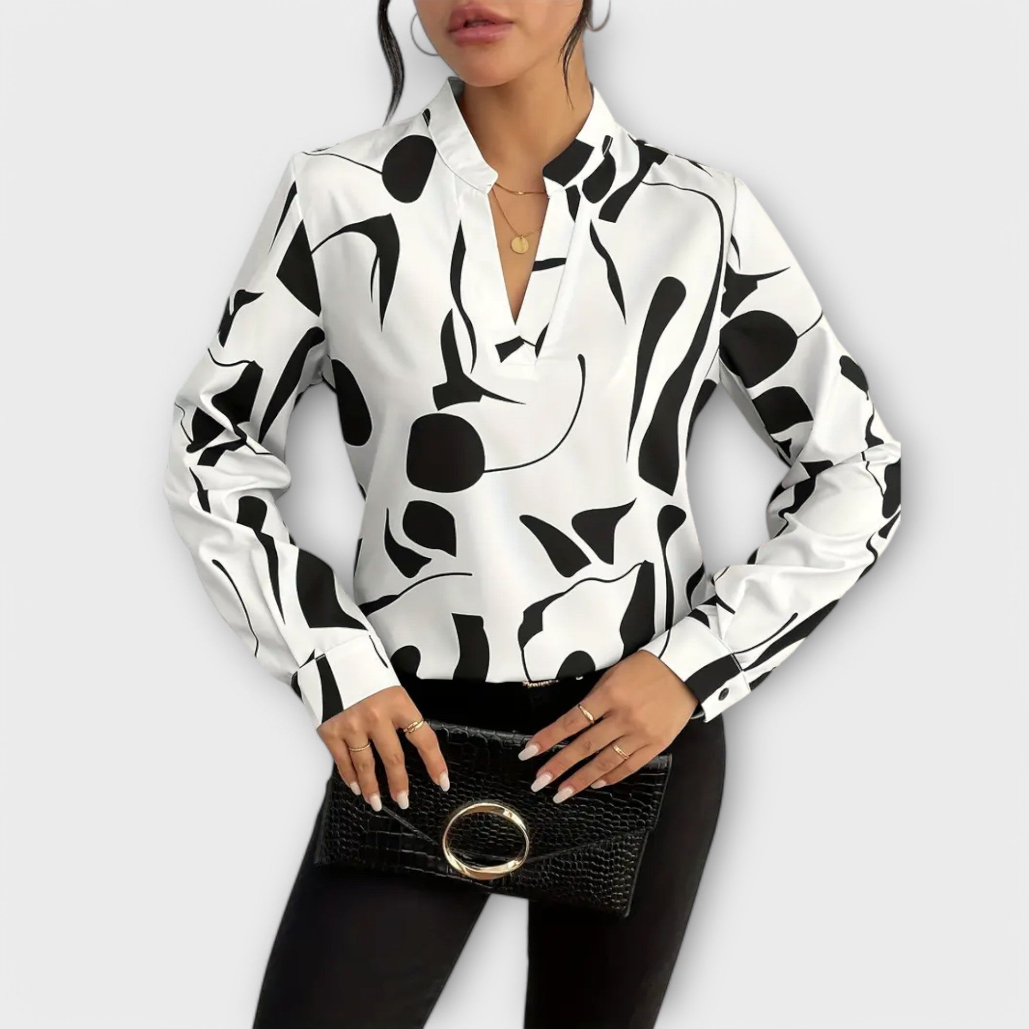 Elegant long-sleeve blouse with a V-neck.